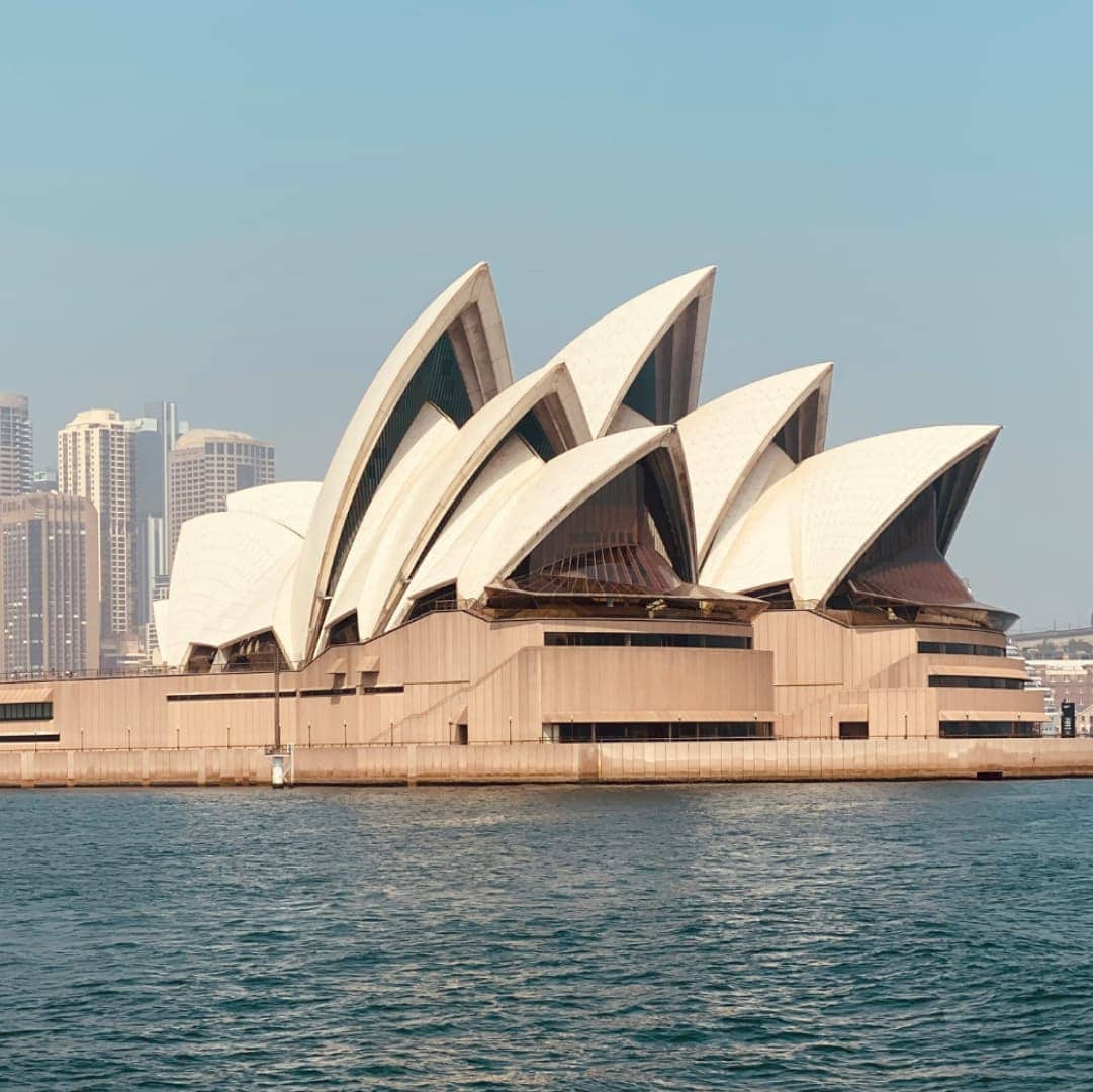 An image of the Sydney Opera House from the water for family office Australia regions page.
