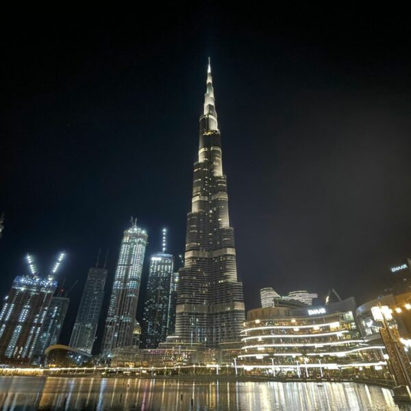Burj Khalifa and Downtown Dubai skyline illuminated at night, representing Dubai family offices and private wealth hub
