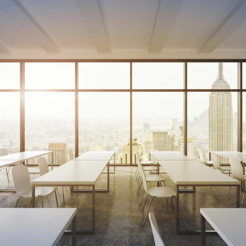 Boardroom overlooking city skyline, representing family offices assessing AI startup investments